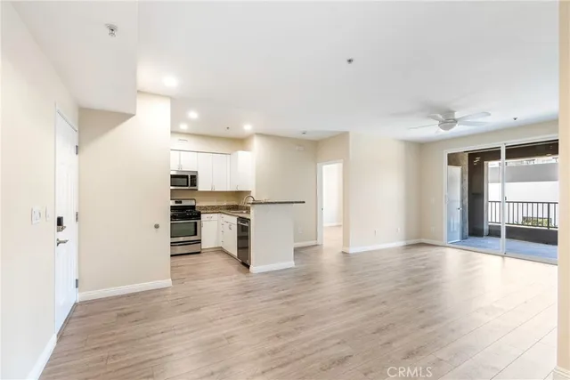 a view of kitchen with wooden floor