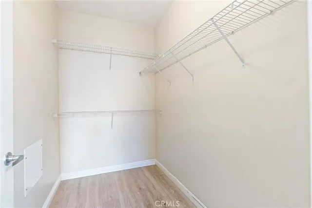 a view of a room with racks on the wall