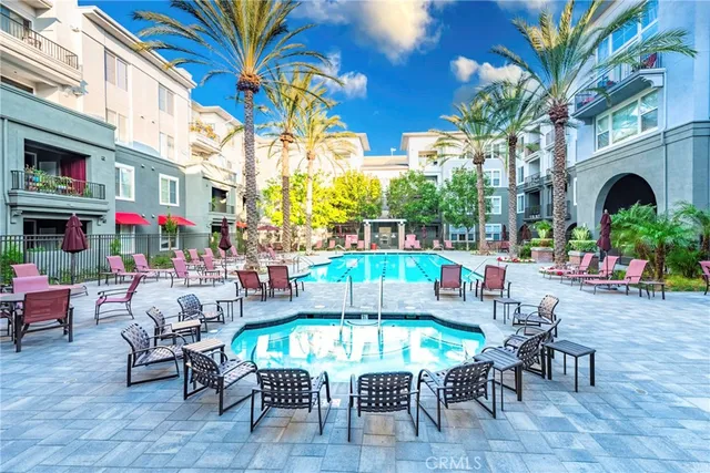 a view of a tables and chairs in patio