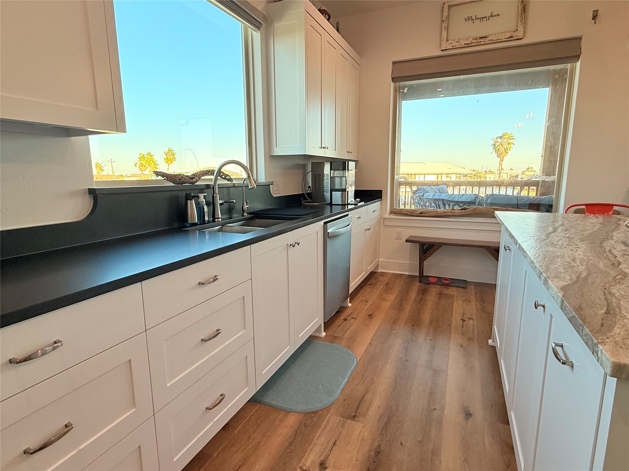 2023 County Road 201 Sargent, TX 77414 - Photo 14 of 45 Spacious kitchen with beautifully designed island for gathering and for storage.