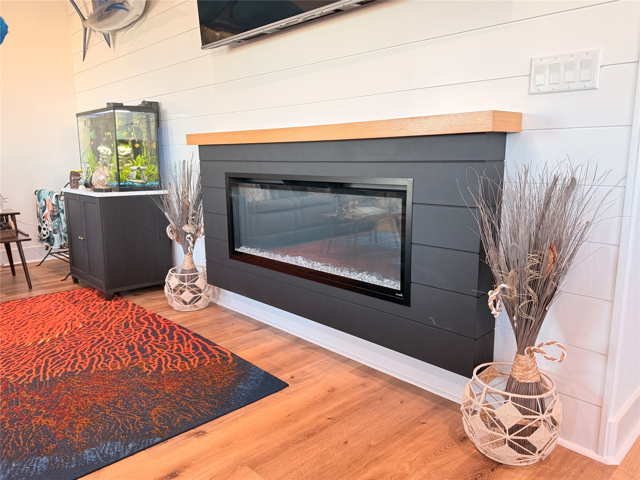 2023 County Road 201 Sargent, TX 77414 - Photo 19 of 45 Electric fireplace.