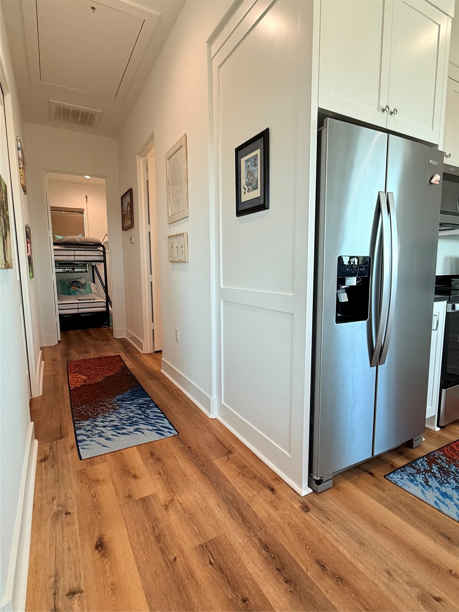 2023 County Road 201 Sargent, TX 77414 - Photo 21 of 45 Hallway to utility and bedrooms.