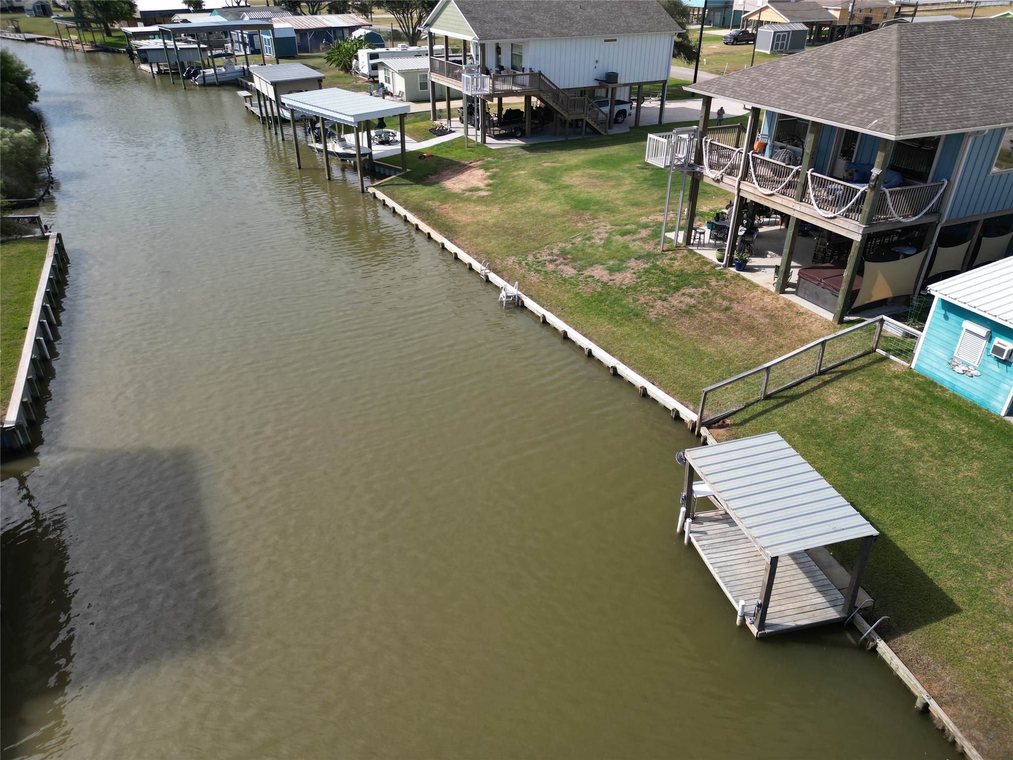 2023 County Road 201 Sargent, TX 77414 - Photo 33 of 45 Canal view with house.