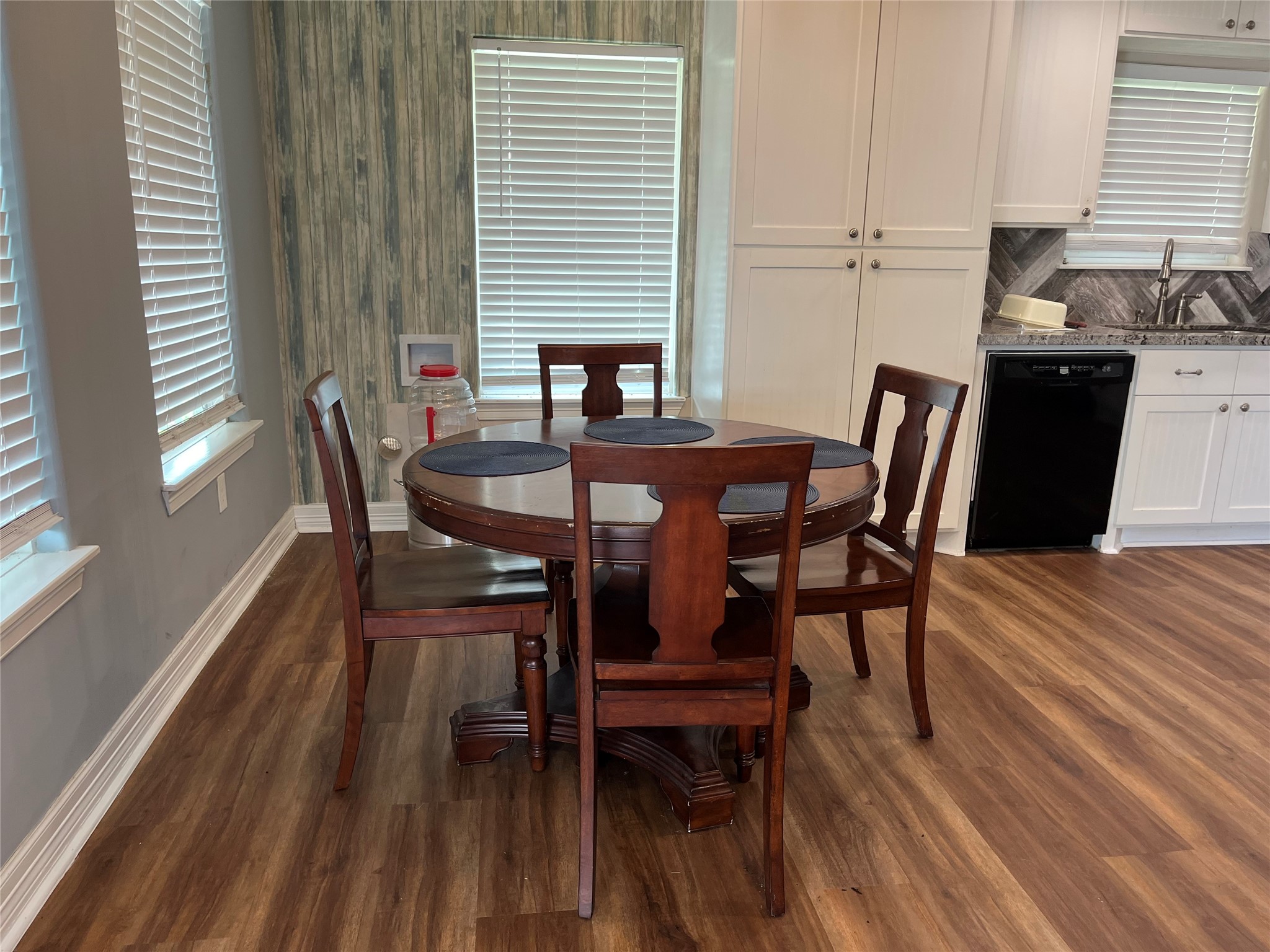 21511 Rio Villa Drive Houston, TX 77049 - Photo 39 of 45 a view of a dining room with furniture and wooden floor