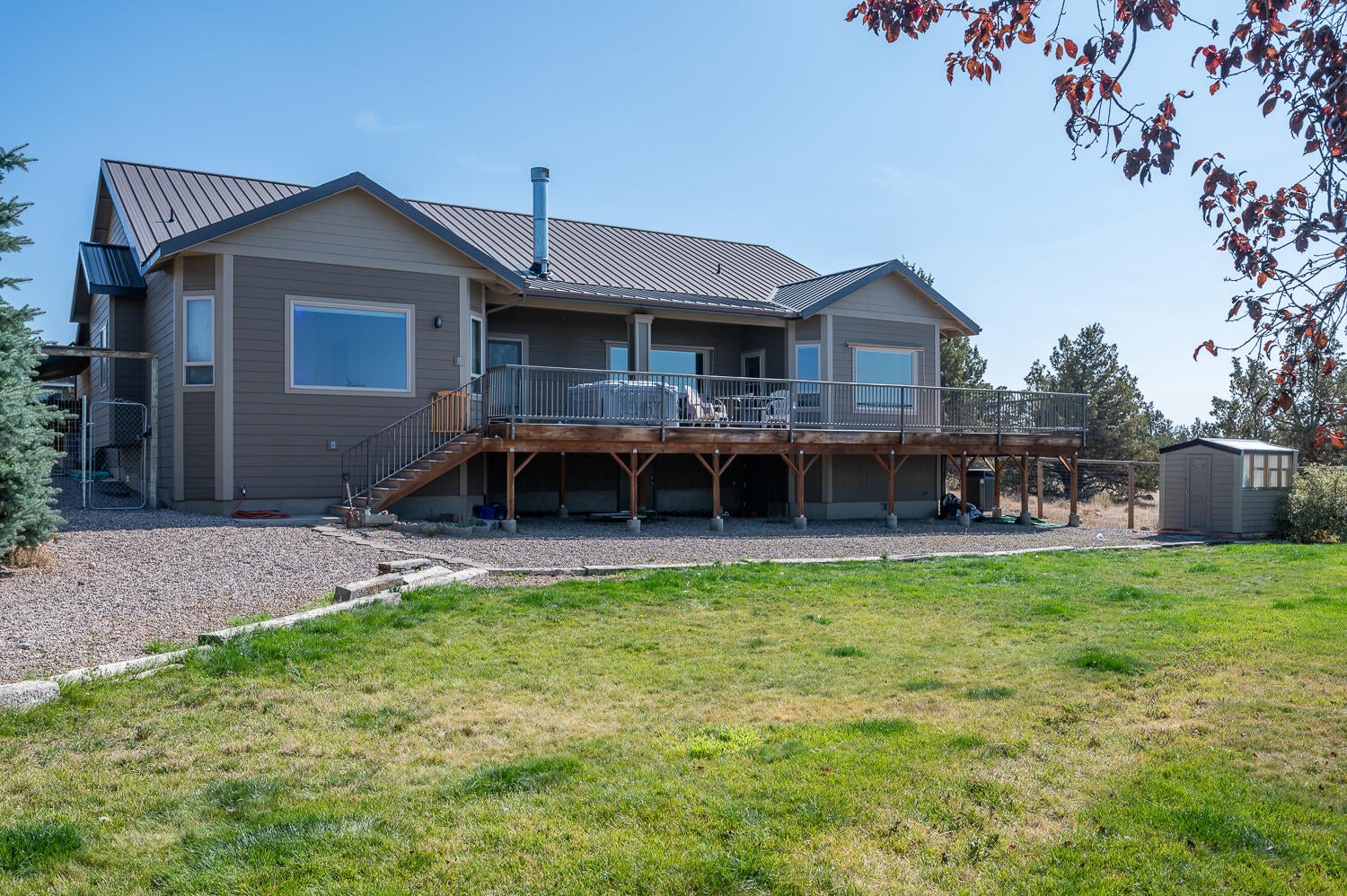 3242 Southwest 43rd Street Redmond, OR 97756 - Photo 27 of 38 Backyard looking up to house