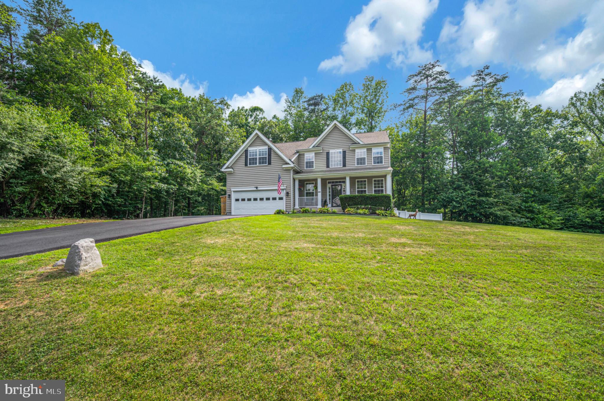 239 Toluca Road Stafford, VA 22556 - Photo 12 of 75 Charming home nestled in lush greenery.