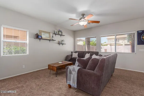 a living room with furniture and a window