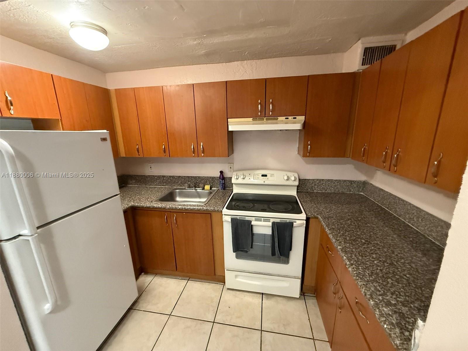 4732 Southwest 33rd Avenue, Unit 103 Dania Beach, FL 33312 - Photo 1 of 6