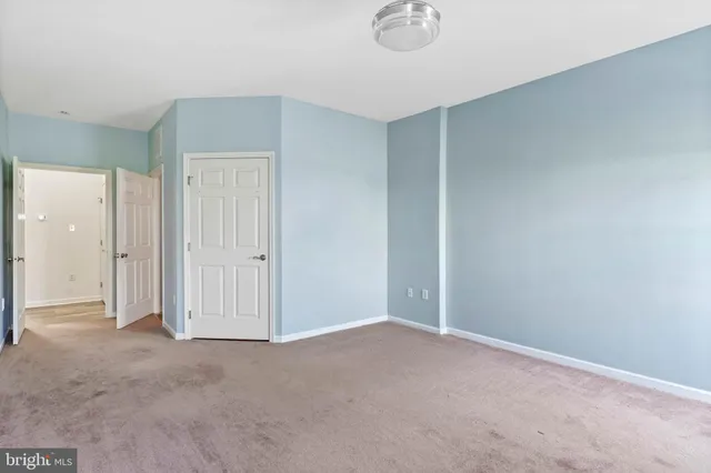 an empty room with a door