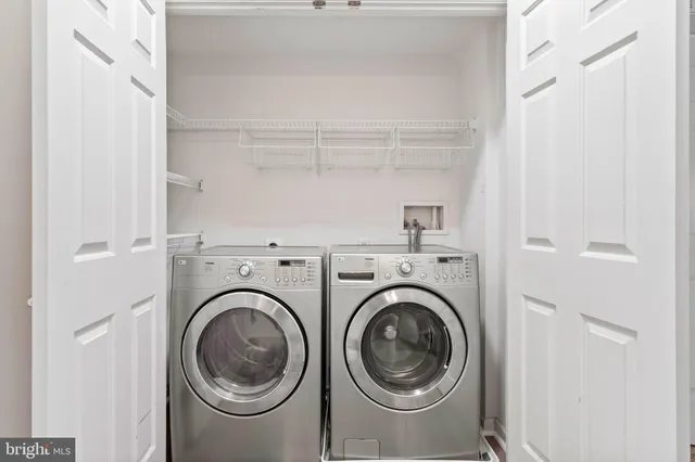 a view of washer and dryer in a utility room