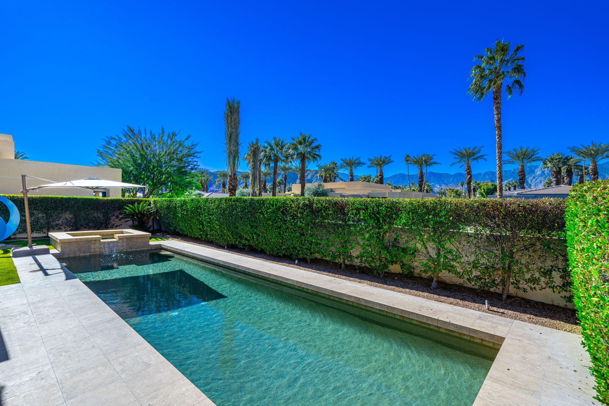 6 Sun Ridge Circle Rancho Mirage, CA 92270 - Photo 13 of 56 a view of a garden with a patio
