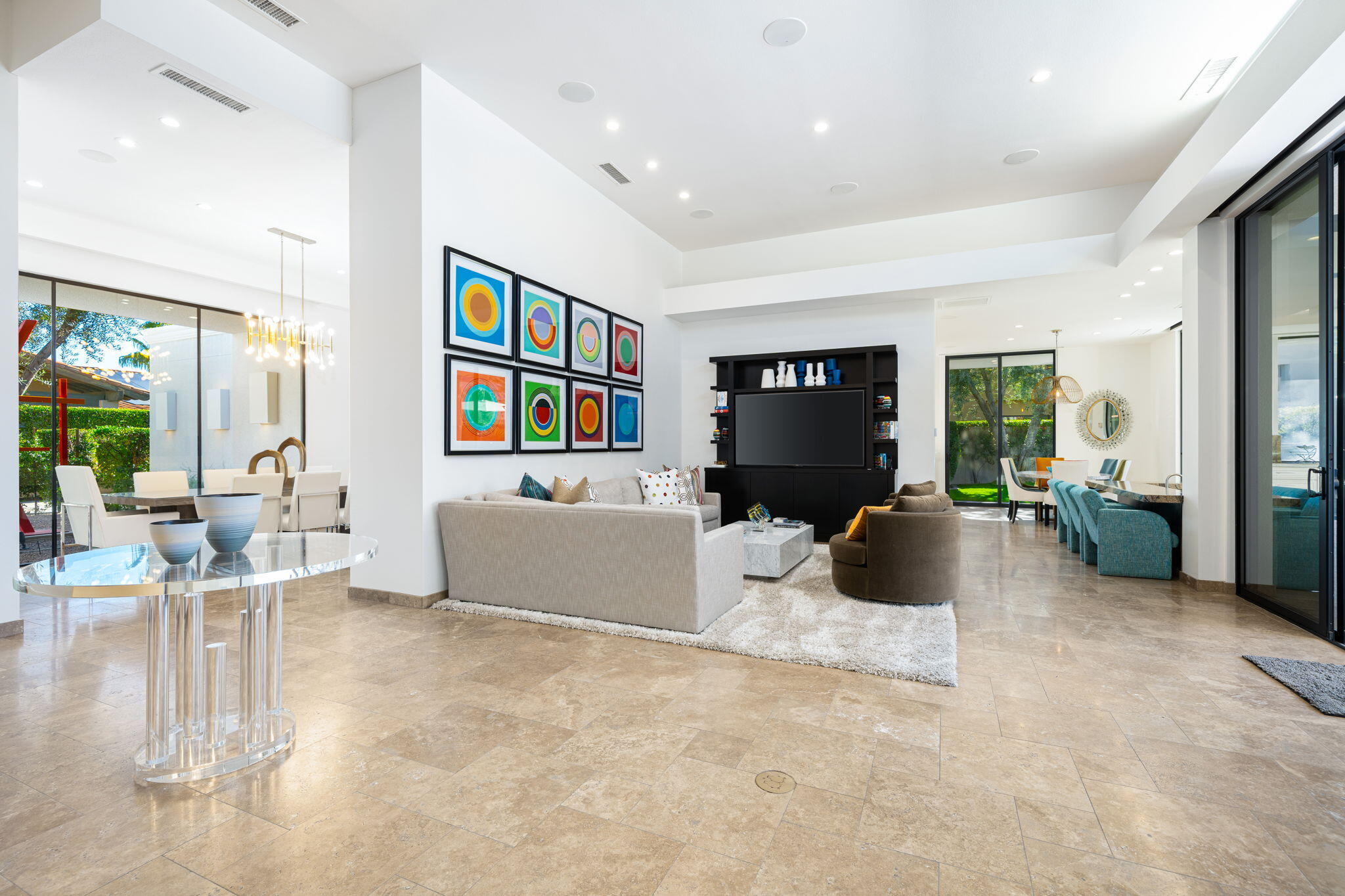 6 Sun Ridge Circle Rancho Mirage, CA 92270 - Photo 17 of 56 a living room with furniture and a flat screen tv