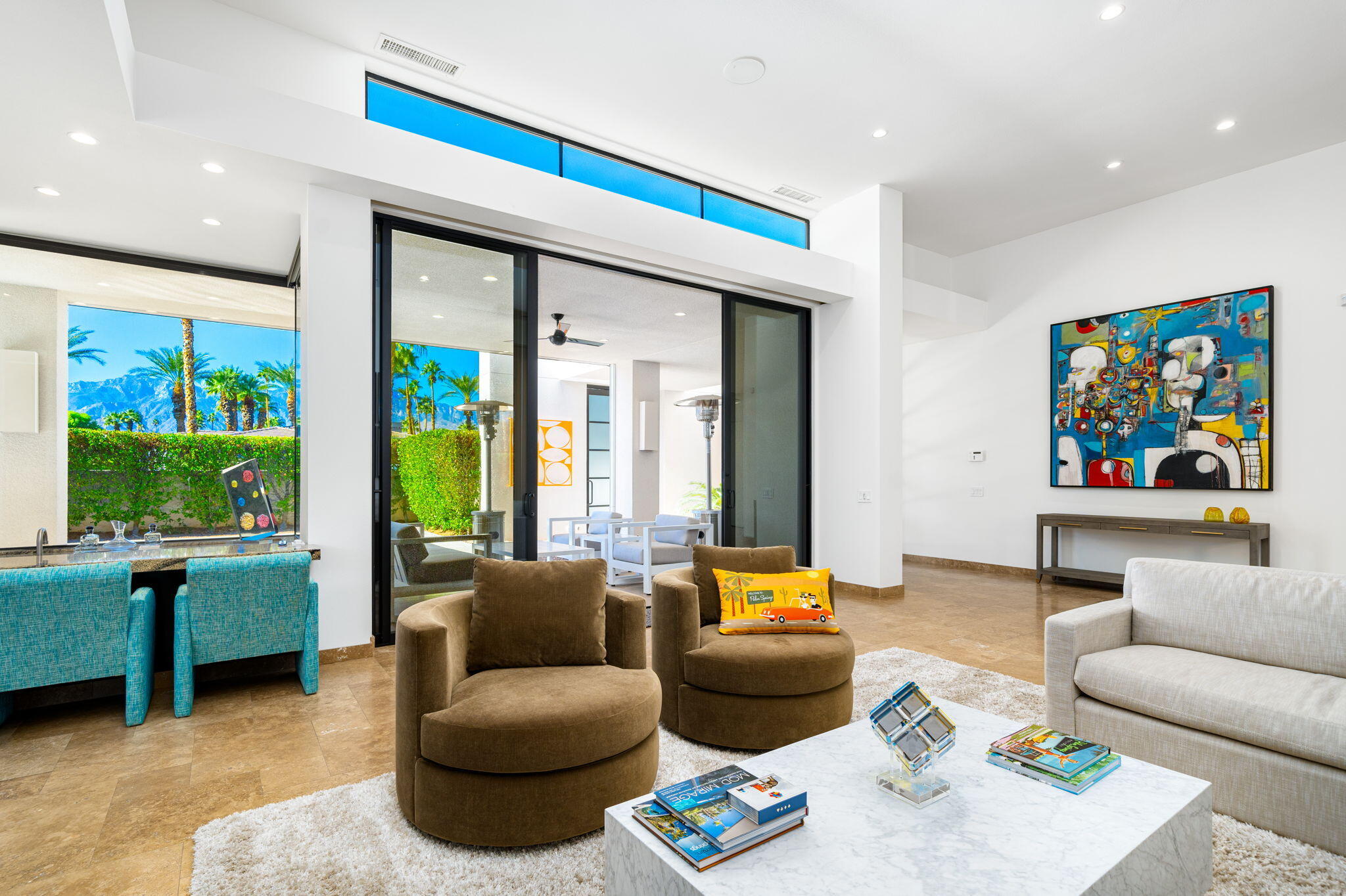6 Sun Ridge Circle Rancho Mirage, CA 92270 - Photo 19 of 56 a living room with furniture and a large window