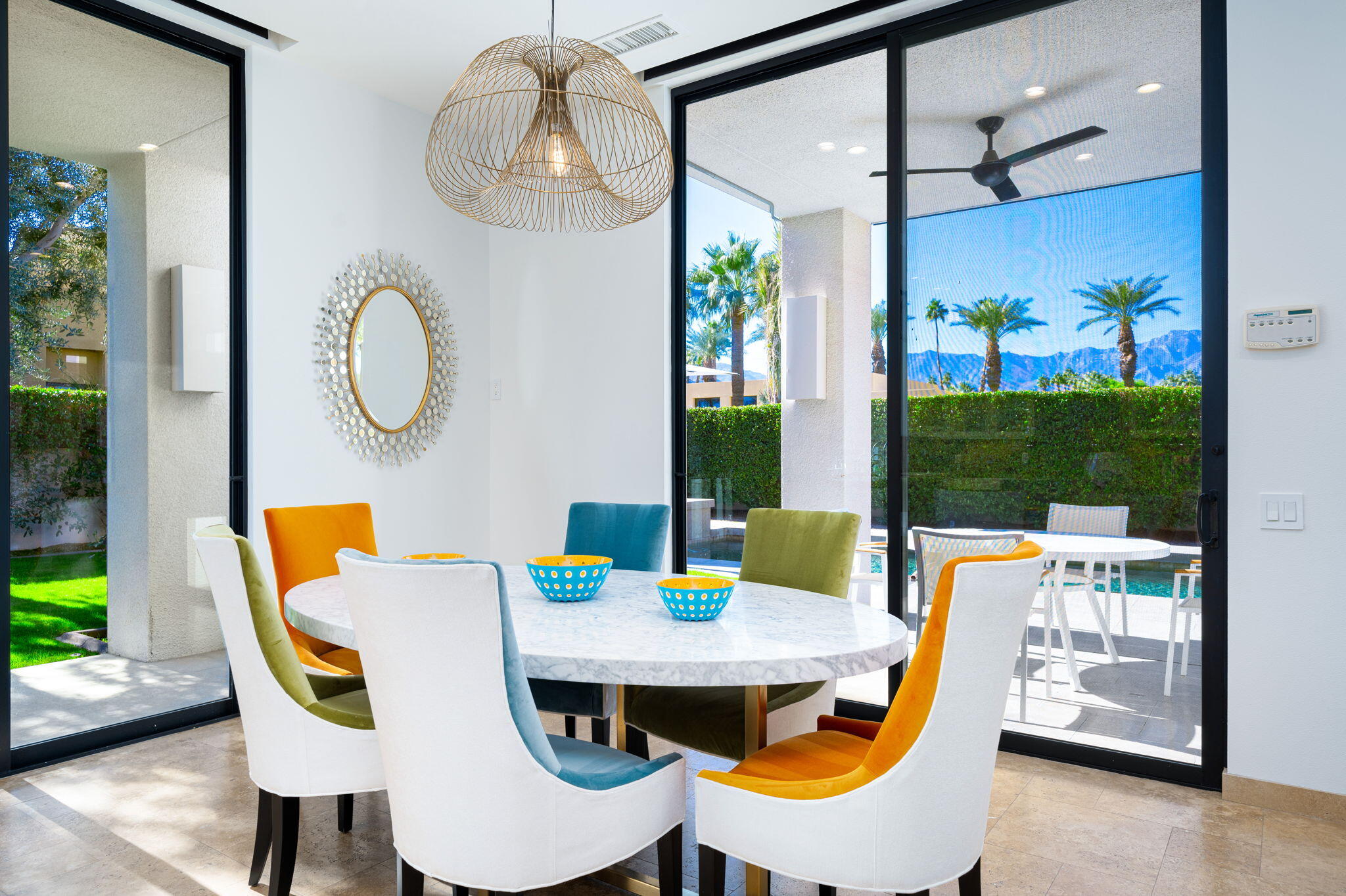 6 Sun Ridge Circle Rancho Mirage, CA 92270 - Photo 22 of 56 a view of a dining room with furniture and wooden floor