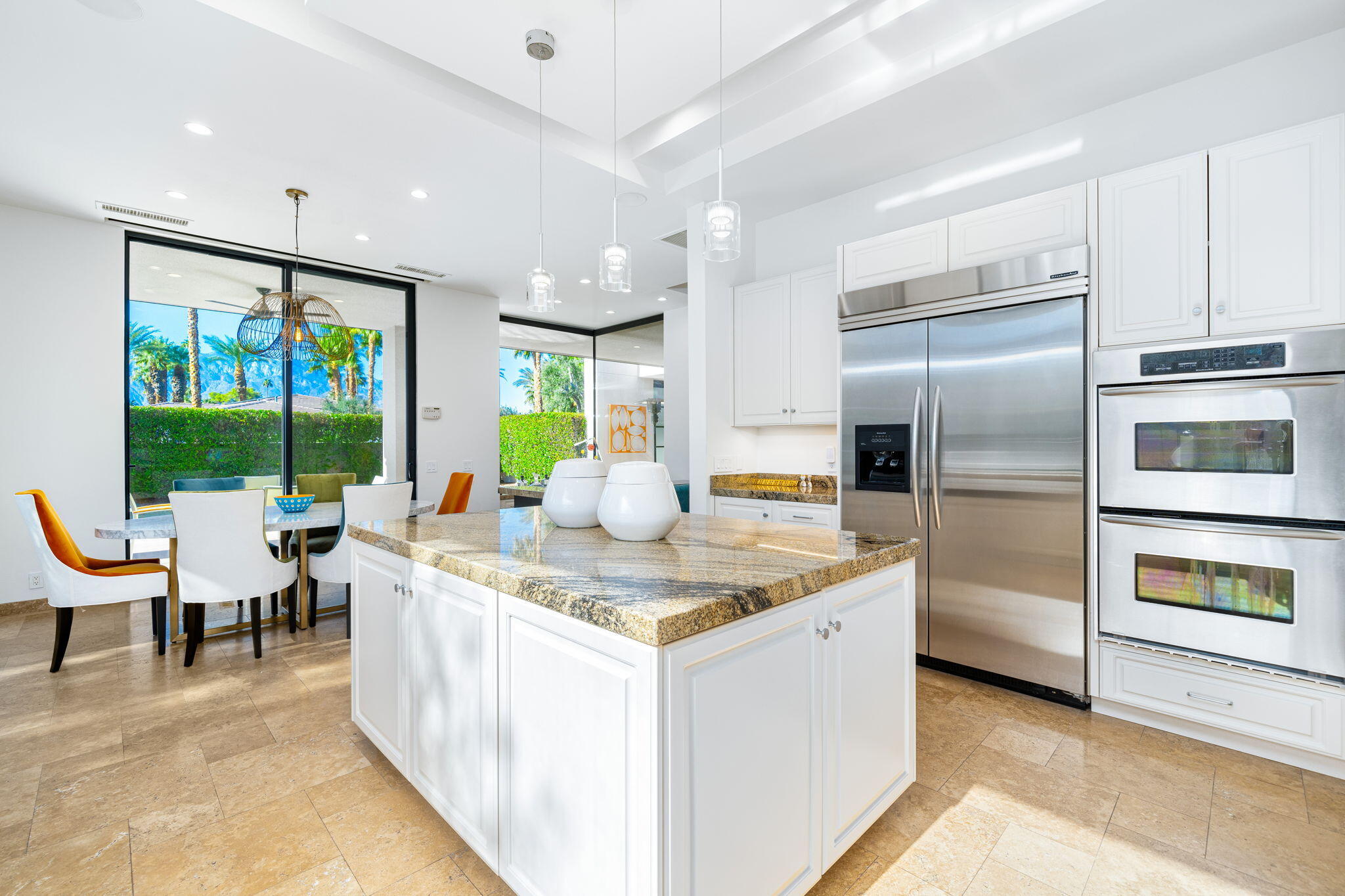6 Sun Ridge Circle Rancho Mirage, CA 92270 - Photo 24 of 56 a kitchen with stainless steel appliances granite countertop a sink and a refrigerator