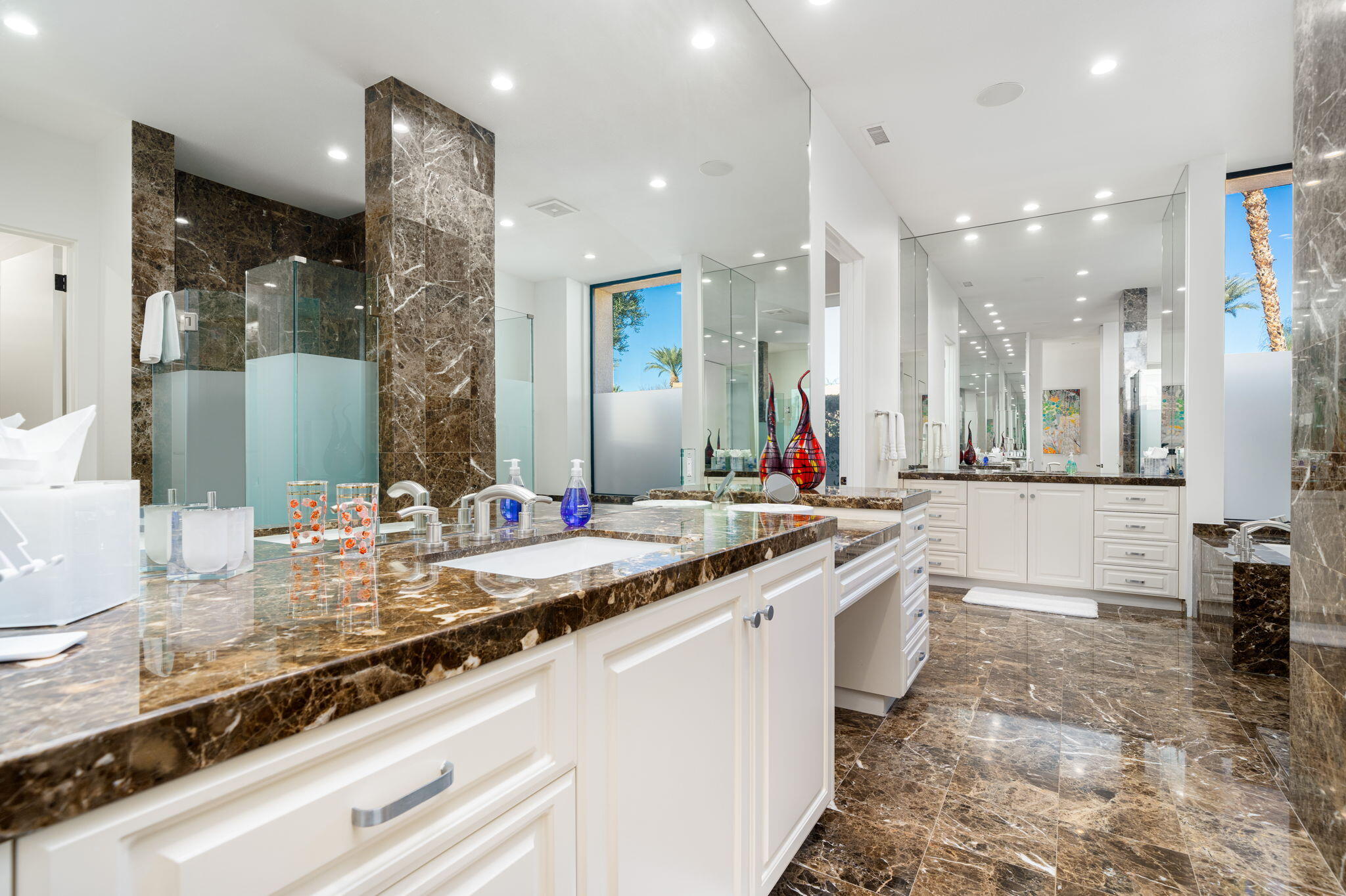 6 Sun Ridge Circle Rancho Mirage, CA 92270 - Photo 35 of 56 a large kitchen with kitchen island a sink appliances and a counter top space