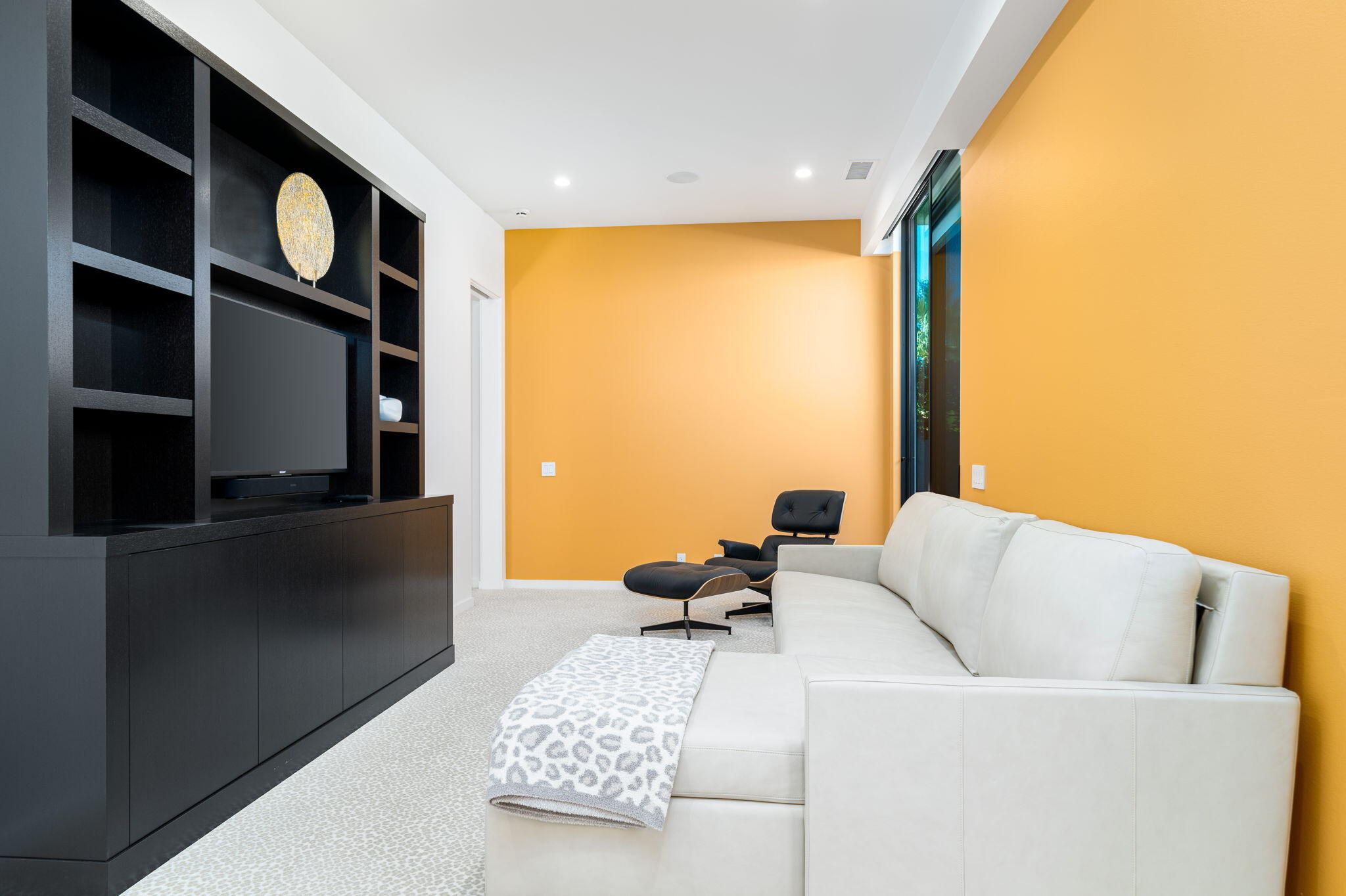 6 Sun Ridge Circle Rancho Mirage, CA 92270 - Photo 38 of 56 a living room with furniture and a floor to ceiling window