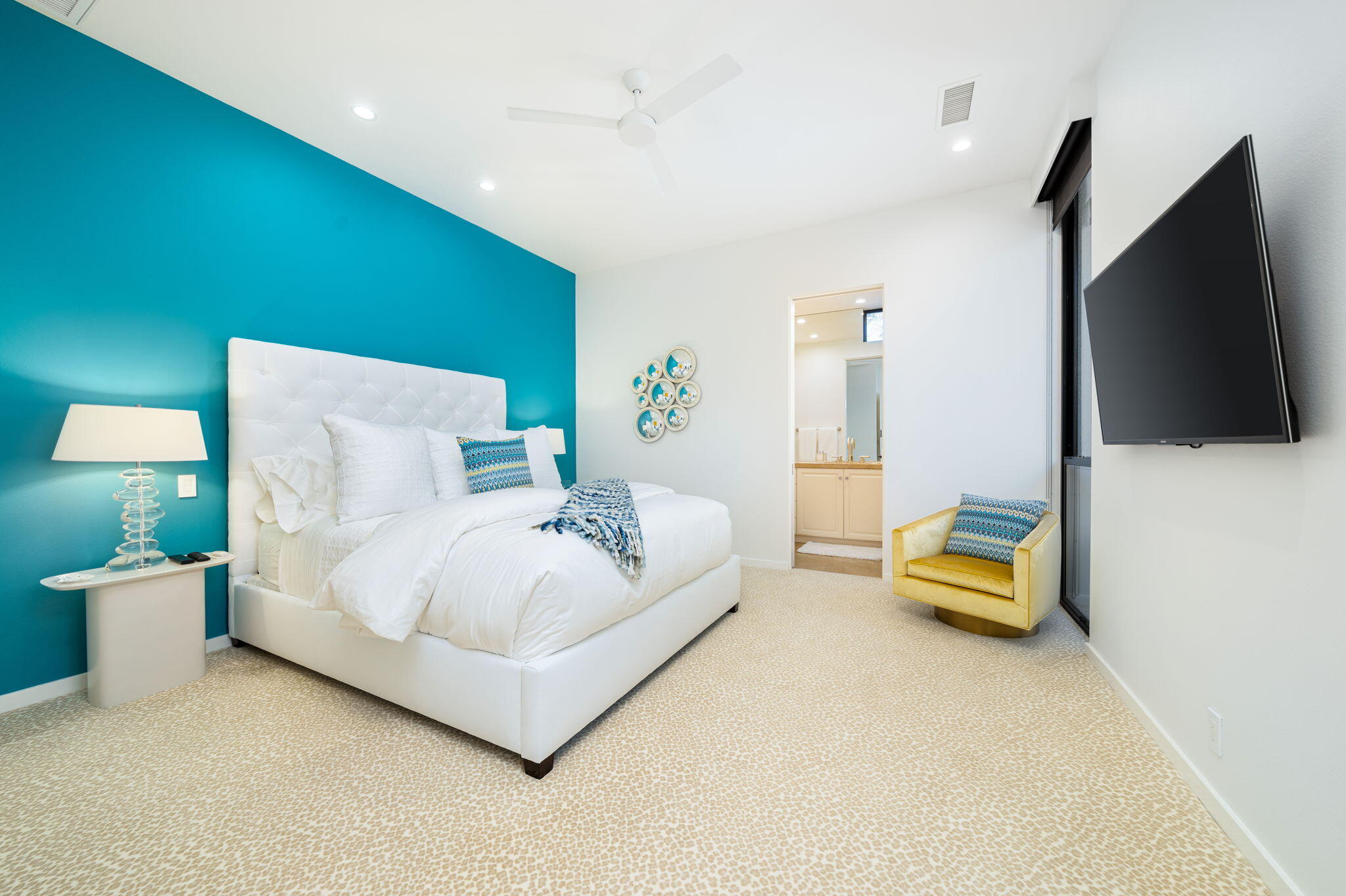 6 Sun Ridge Circle Rancho Mirage, CA 92270 - Photo 40 of 56 a bedroom with a bed and a flat screen tv