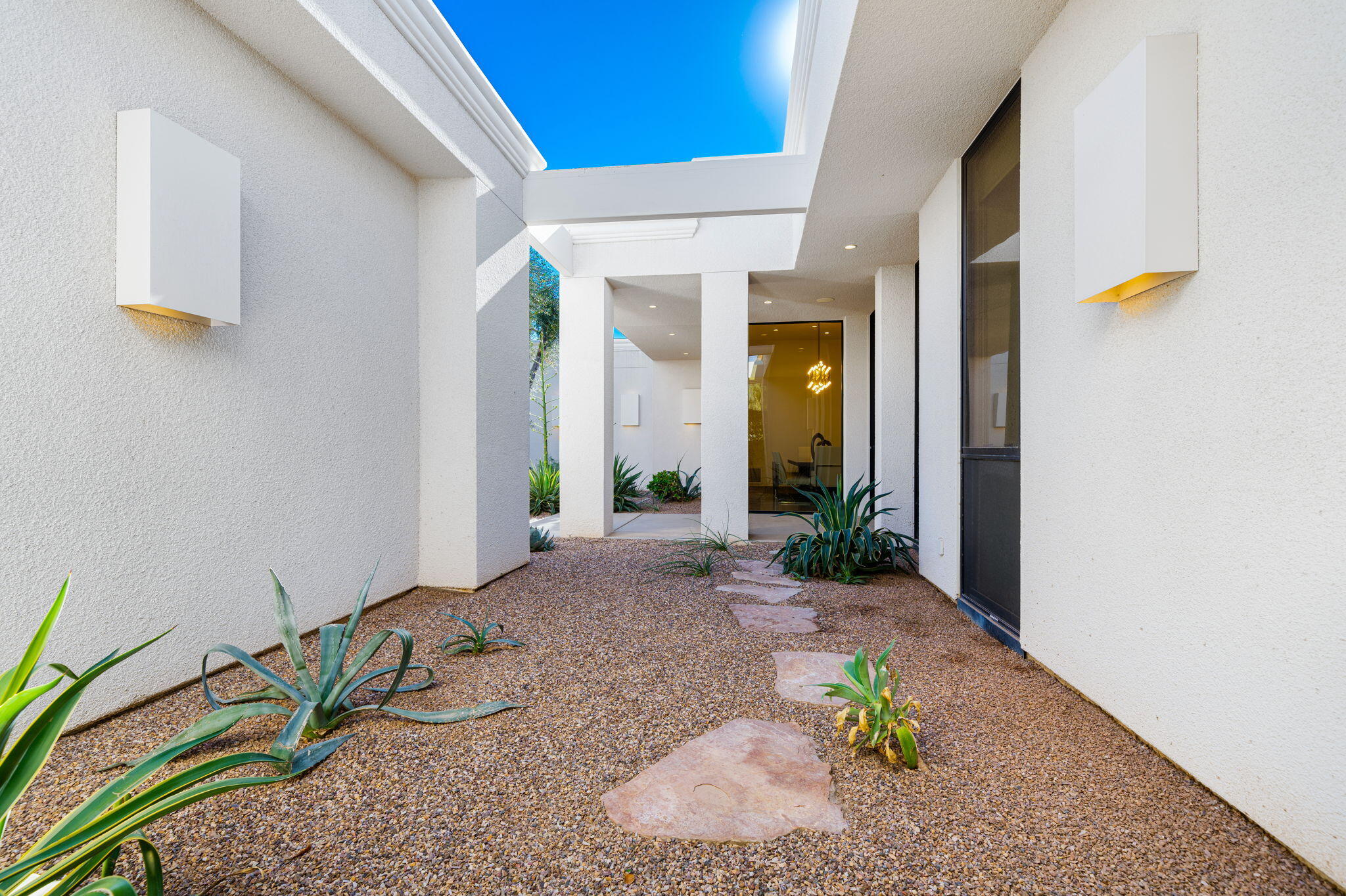 6 Sun Ridge Circle Rancho Mirage, CA 92270 - Photo 42 of 56 a view of a entryway door front of house