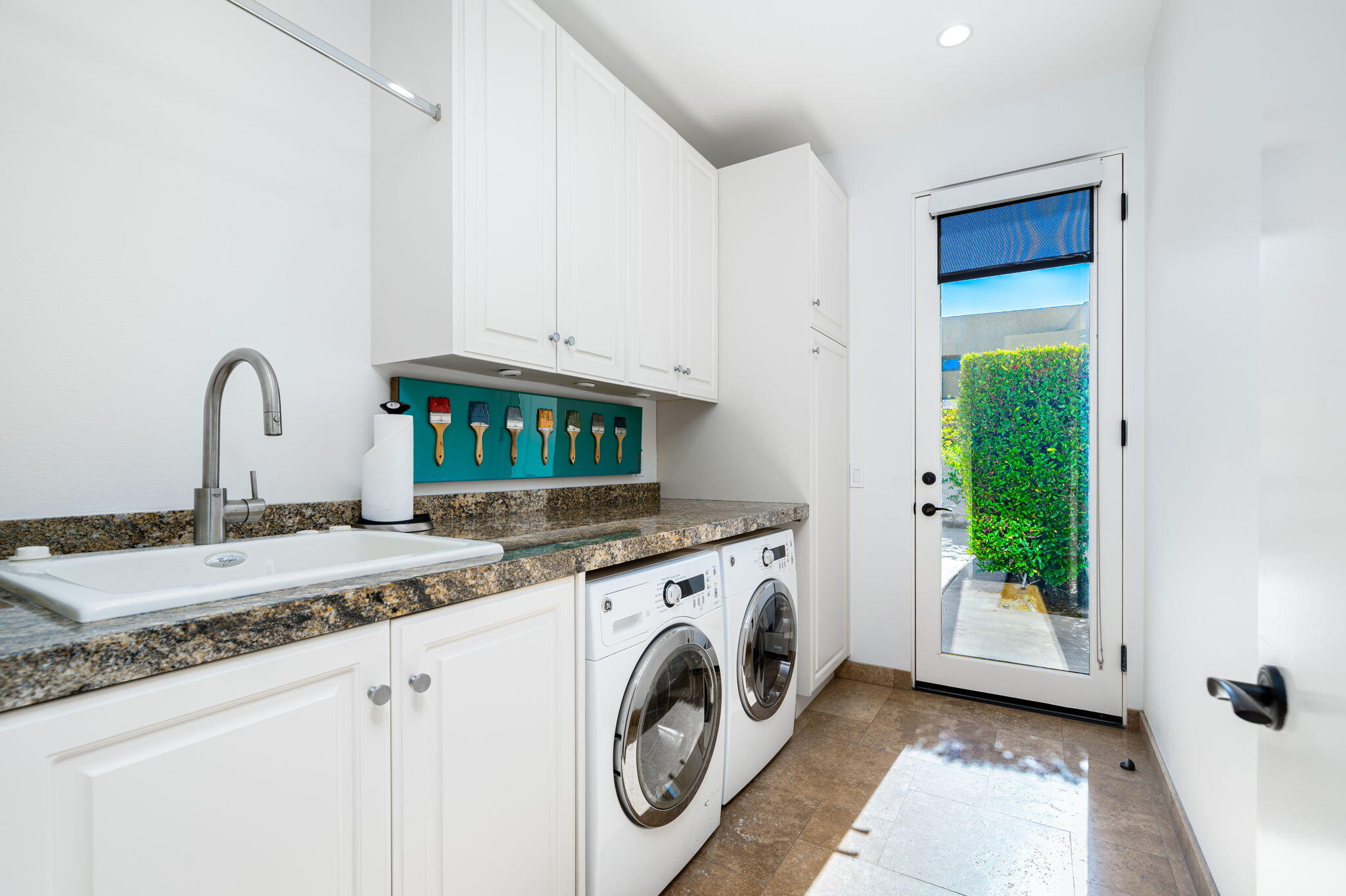 6 Sun Ridge Circle Rancho Mirage, CA 92270 - Photo 46 of 56 a utility room with sink dryer and washer