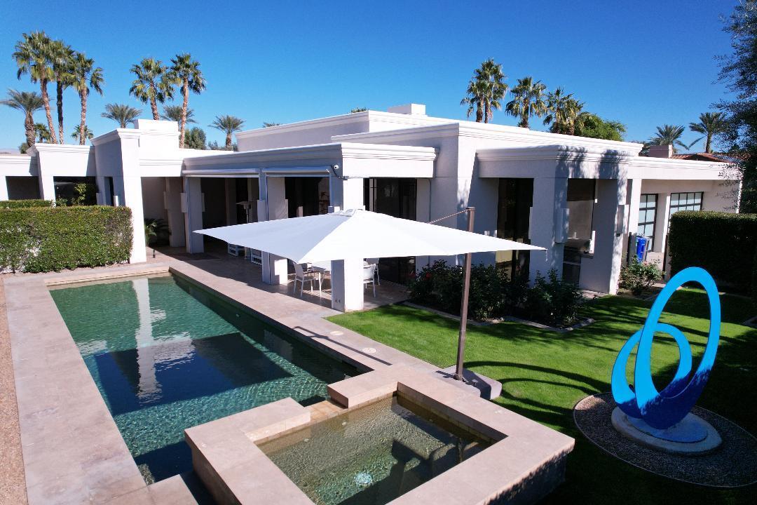 6 Sun Ridge Circle Rancho Mirage, CA 92270 - Photo 49 of 56 a view of a house with a yard