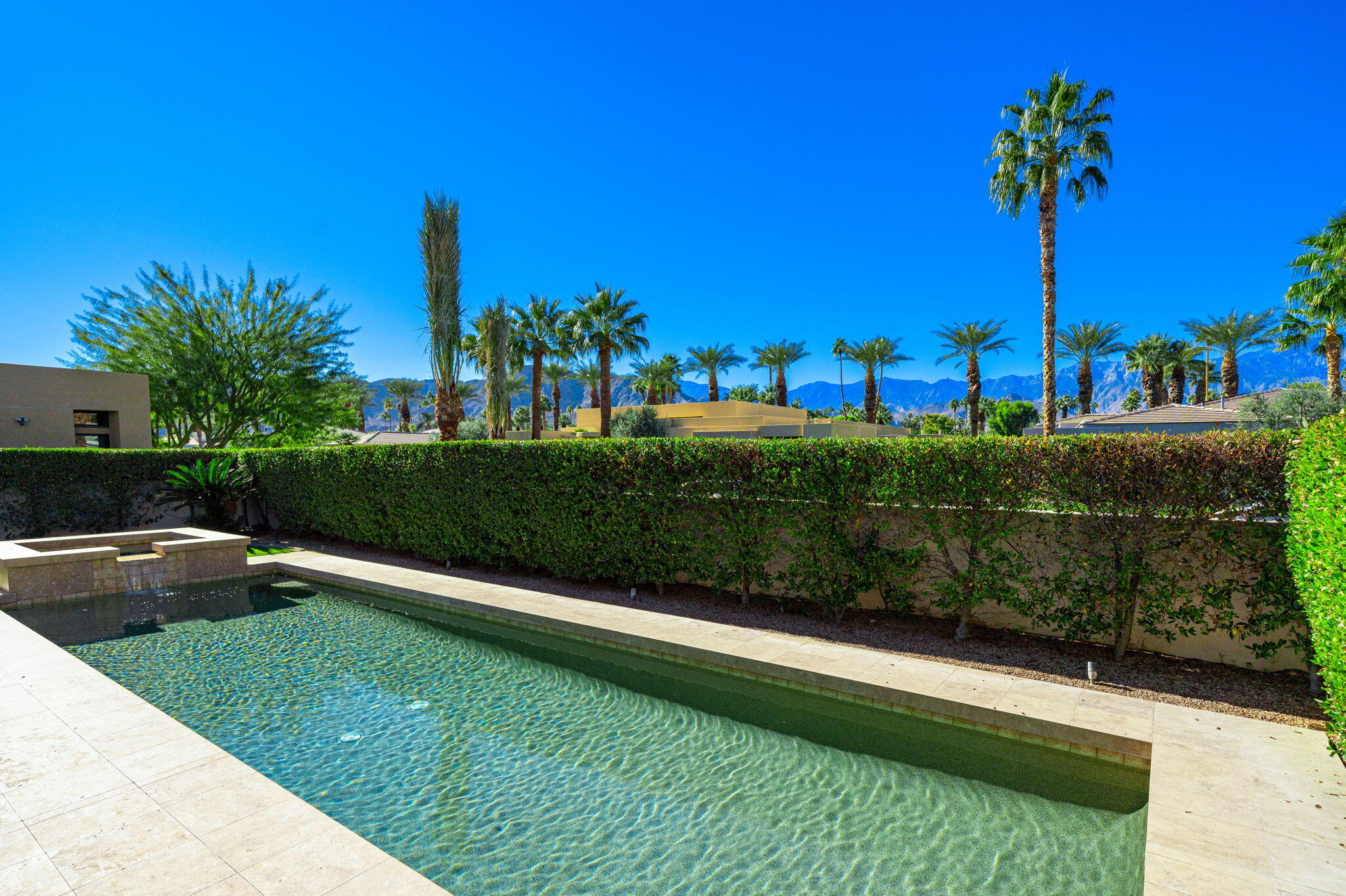 6 Sun Ridge Circle Rancho Mirage, CA 92270 - Photo 55 of 56 a view of a garden with a house
