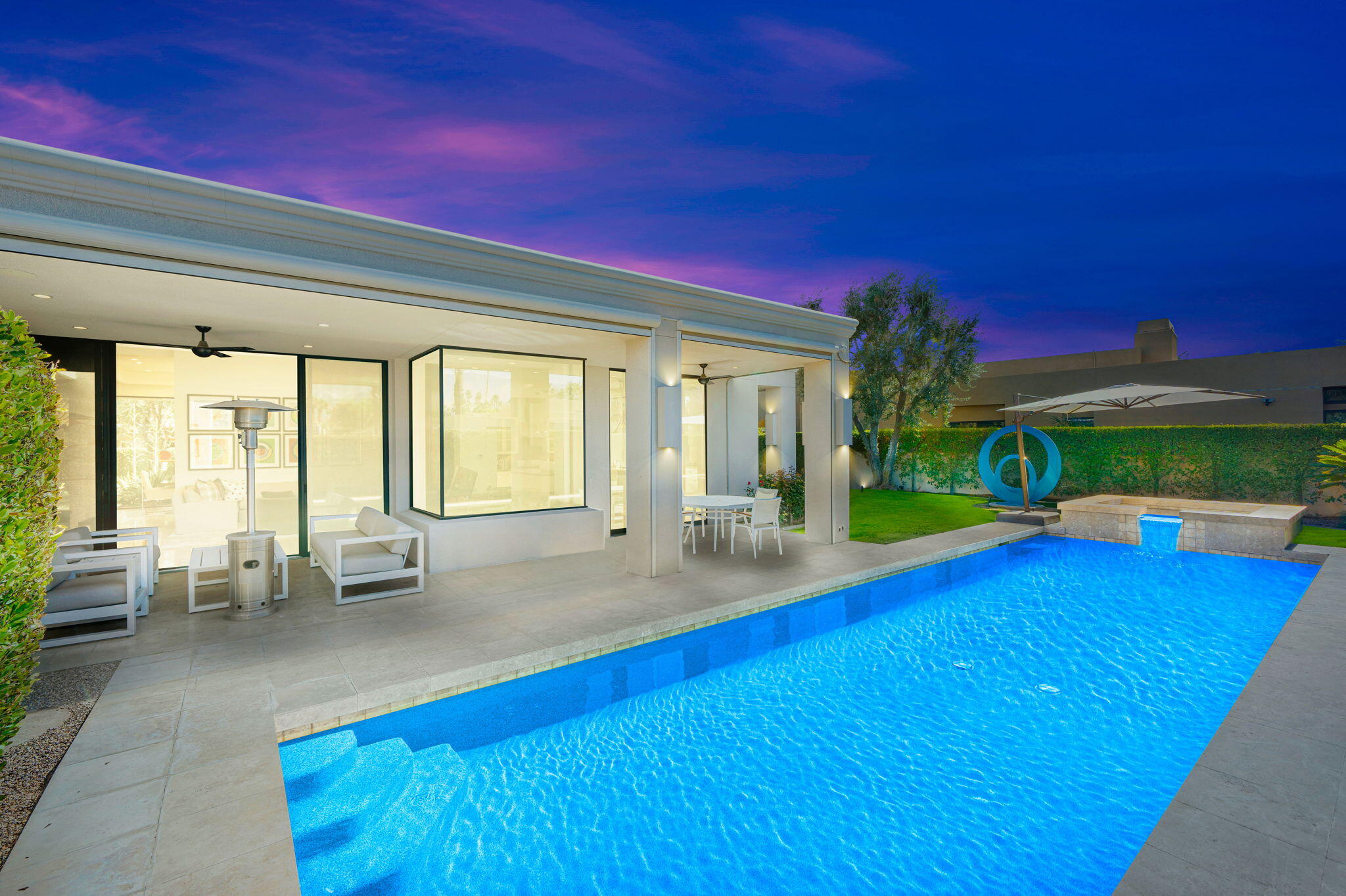 6 Sun Ridge Circle Rancho Mirage, CA 92270 - Photo 10 of 56 a living room with furniture and a large window