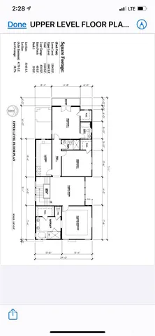 a black and white photo of a large building