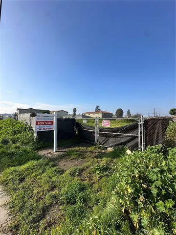 a view of a chairs and table in a patio