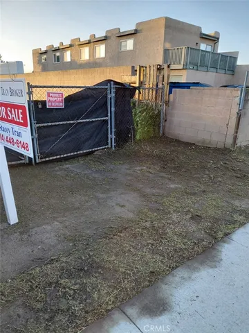 a view of a chairs and table in the room