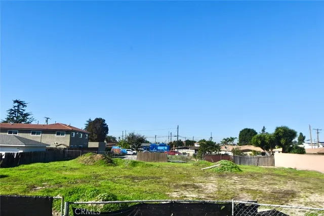a view of swimming pool with a yard