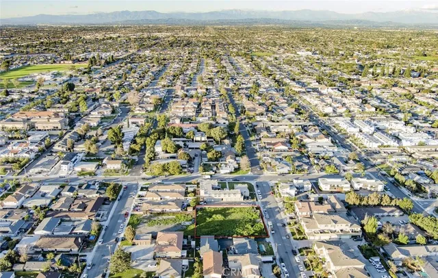 a view of swimming pool with outdoor seating and yard