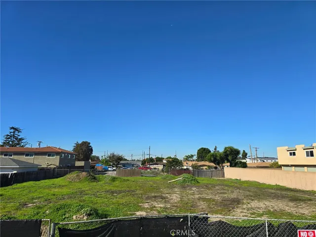 a view of a yard with an outdoor space