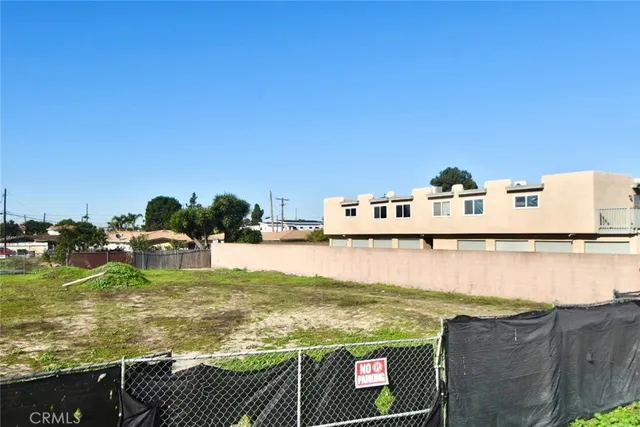 a view of a swimming pool with chairs