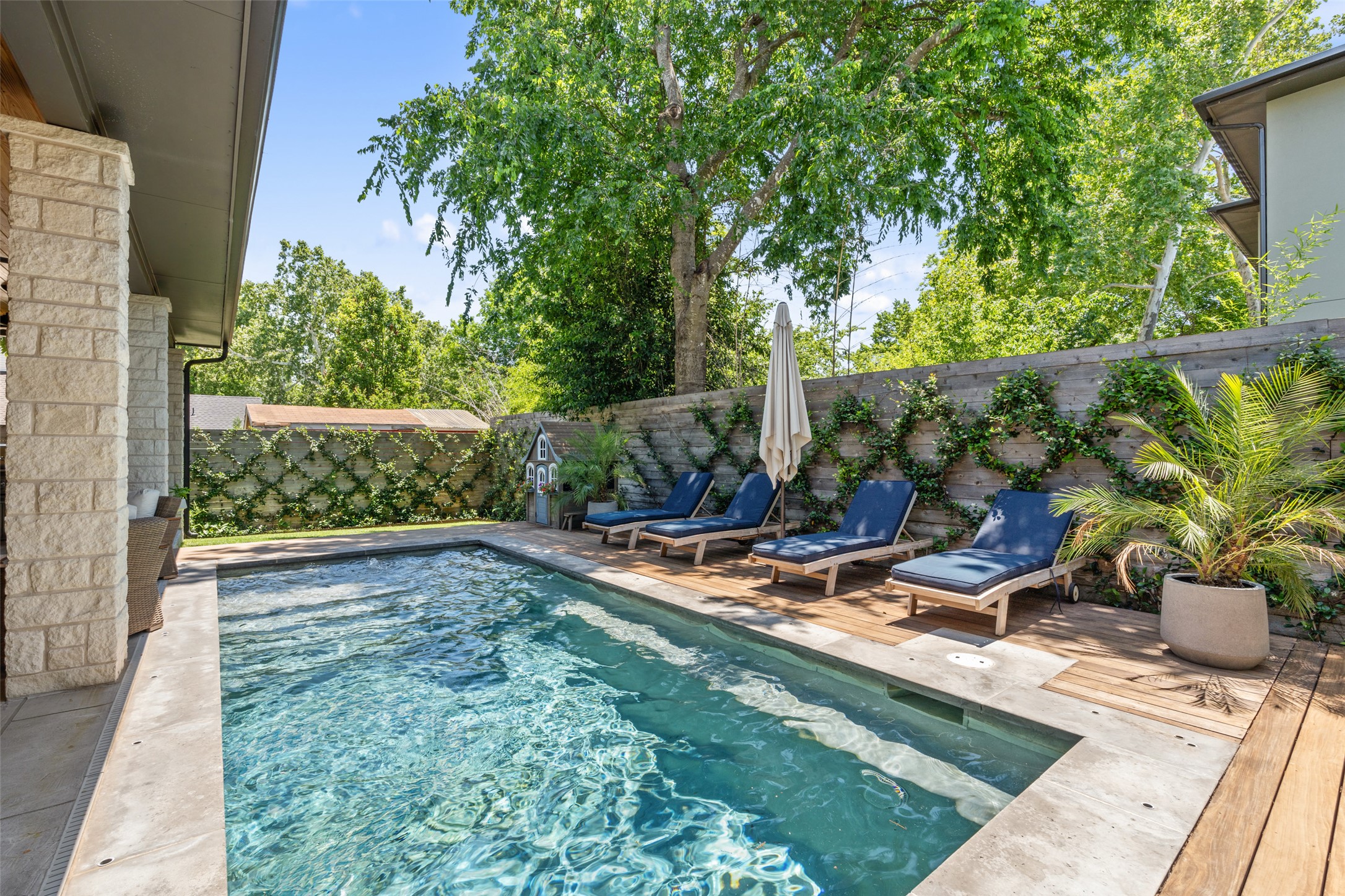 2107 Peach Tree Street Austin, TX 78704 - Photo 2 of 40 View of swimming pool featuring a fenced backyard