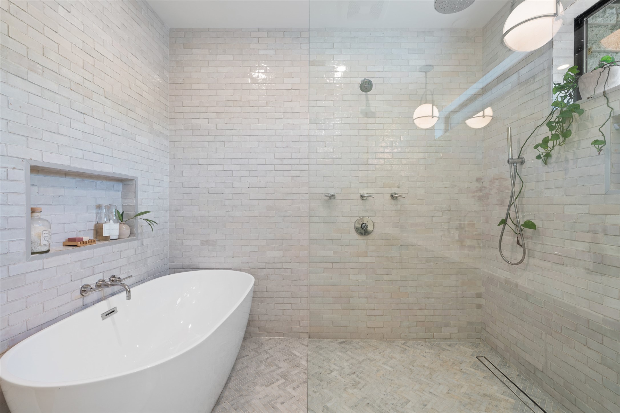 2107 Peach Tree Street Austin, TX 78704 - Photo 22 of 40 Bathroom with a freestanding bath and a walk in shower