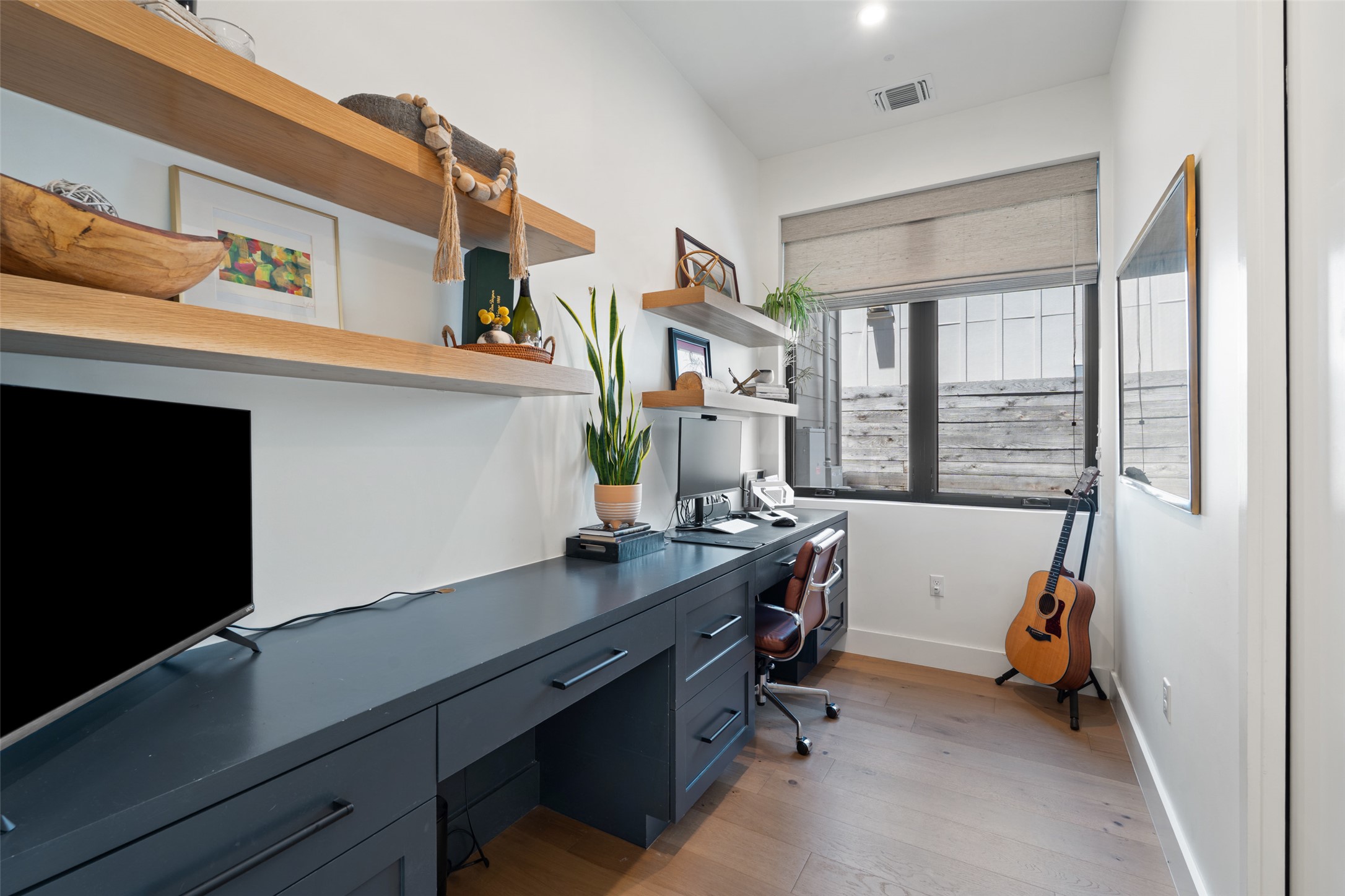 2107 Peach Tree Street Austin, TX 78704 - Photo 25 of 40 Office space featuring light wood-style flooring and baseboards