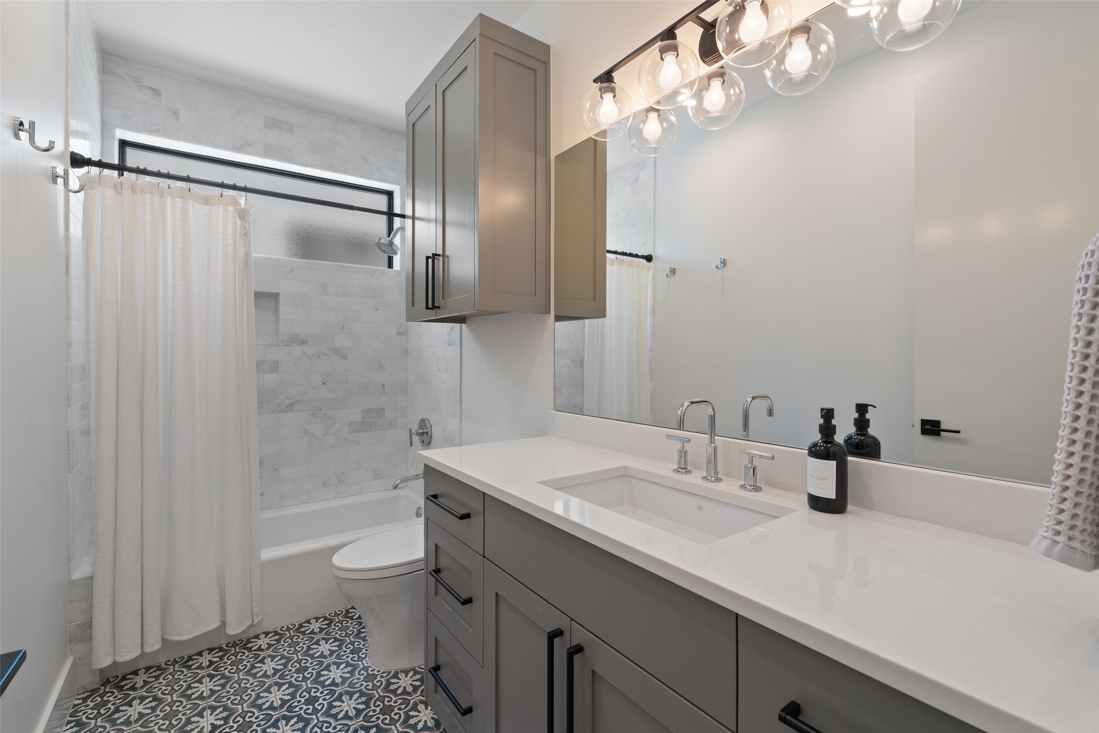 2107 Peach Tree Street Austin, TX 78704 - Photo 28 of 40 Bathroom featuring toilet, vanity, and shower / tub combo