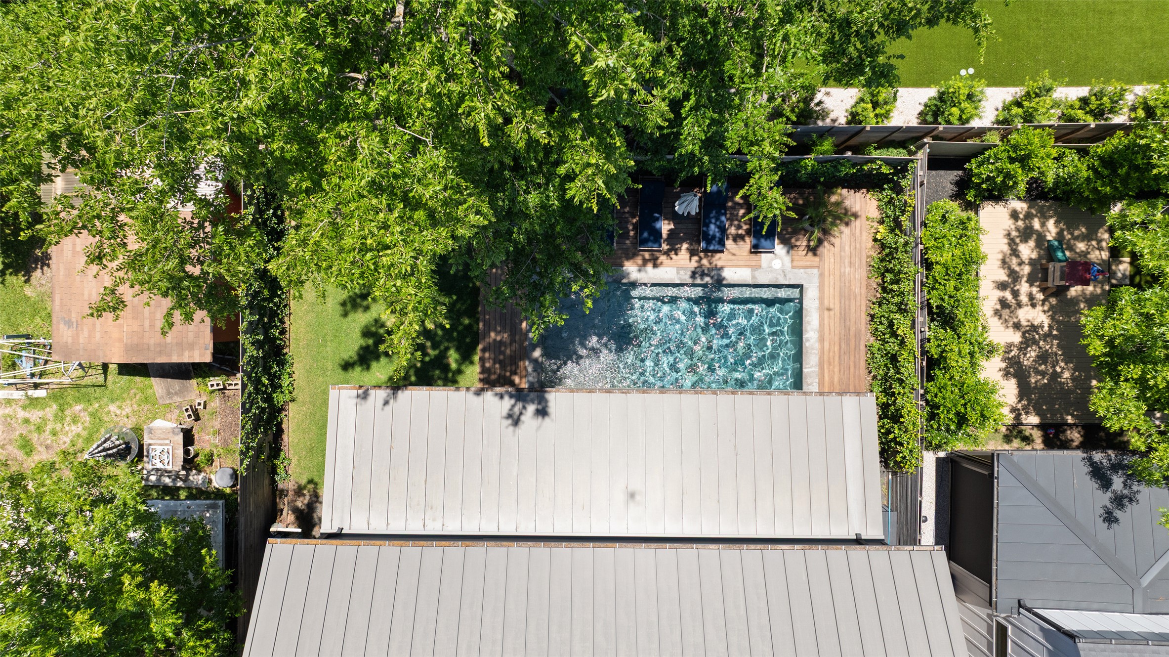 2107 Peach Tree Street Austin, TX 78704 - Photo 35 of 40 Drone / aerial view of a pool area