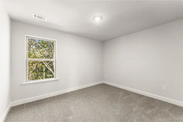 an empty room with a window