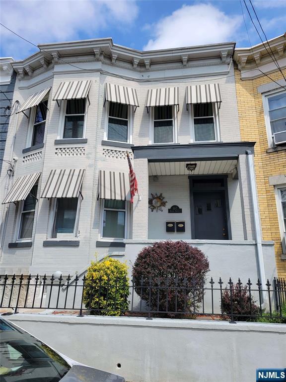 307 Henry Street, Unit 2 Fairview, NJ 07022 - Photo 1 of 10 front view of a building