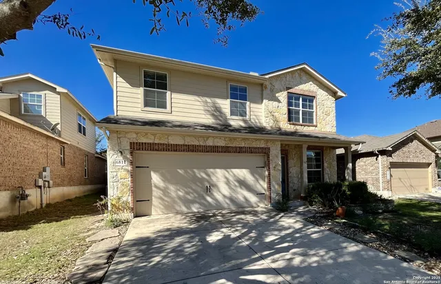 a view of a garden with an outdoor space