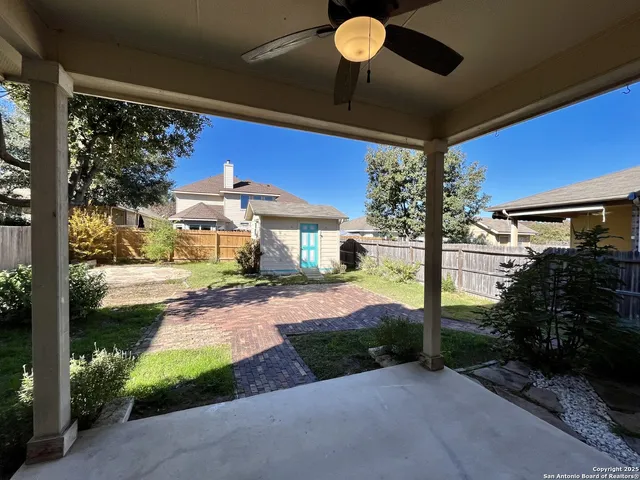 a view of porch with a bench