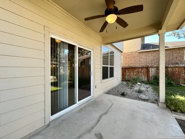 a front view of a house with a yard and porch