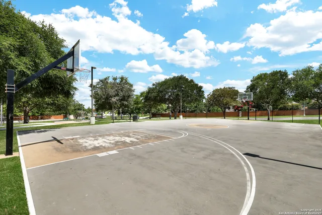 a view of a swimming pool with a lounge chair