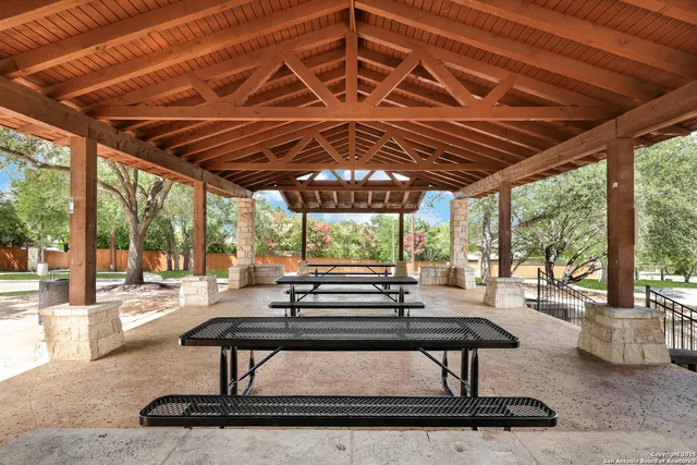 a view of a swimming pool with a lounge chair