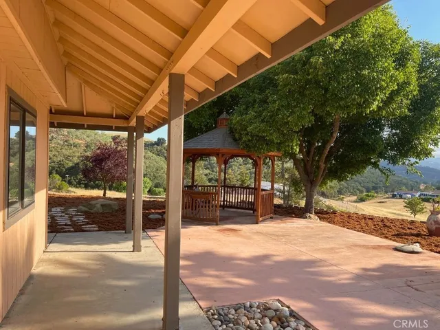 a view of a backyard of a house