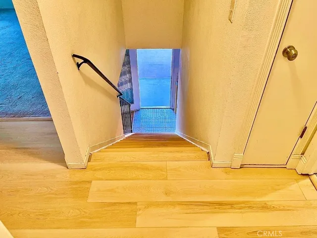 a kitchen with a sink a stove and cabinets
