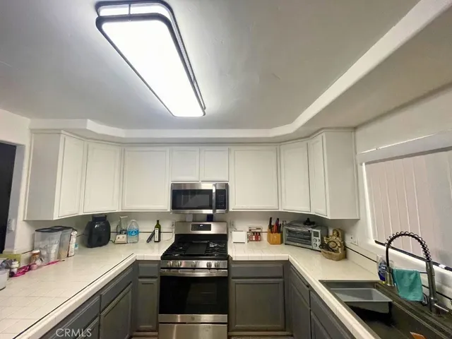 a view of an empty room with closet area