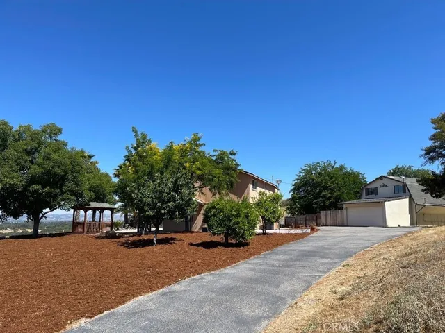 a view of a street with a building in the background